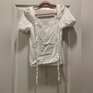 Bow-back white Swiss dot blouse